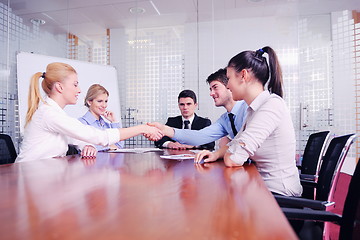 Image showing business people in a meeting at office