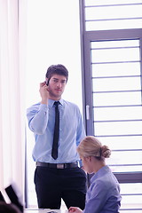 Image showing business people in a meeting at office