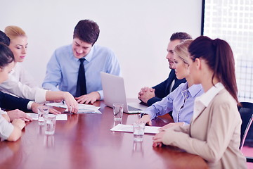 Image showing business people in a meeting at office