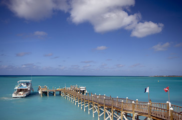 Image showing pier and boat in ocean