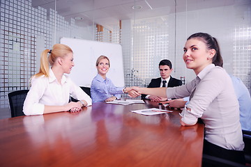 Image showing business people in a meeting at office