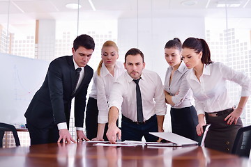 Image showing business people in a meeting at office