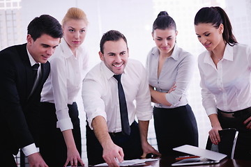 Image showing business people in a meeting at office