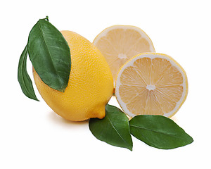 Image showing fresh lemon citrus with cut and green leaves isolated on white b