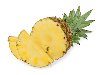 Image showing ripe pineapple with slices isolated on white background