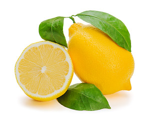 Image showing fresh lemon citrus with cut and green leaves isolated on white b