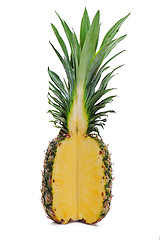 Image showing ripe whole pineapple with a quarter cut isolated on white backgr