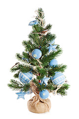 Image showing Christmas fir tree decorated with toys and Christmas decorations