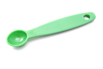 Image showing Green measuring spoon