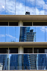 Image showing reflex of some palace in  buenos aires  and a crane