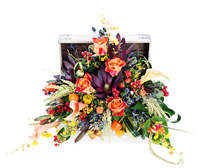 Image showing A colorful floral arrangement of roses, lilies, freesia and iris