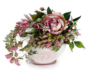 Image showing colorful floral arrangement in a pink ceramic vase, isolated on 