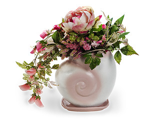 Image showing colorful floral arrangement in a pink ceramic vase, isolated on 