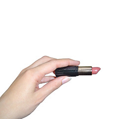 Image showing Hand holding a lipstick