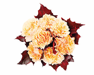 Image showing colorful autumn flower bouquet  from yellow roses and maple leav