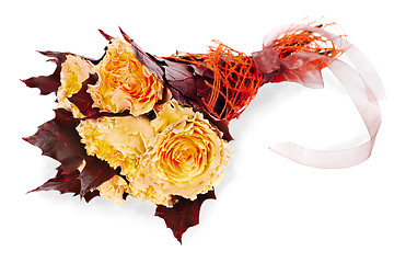 Image showing colorful autumn flower bouquet  from yellow roses and maple leav