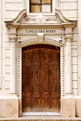 Image showing brown wood old door of a church capilla san roque 