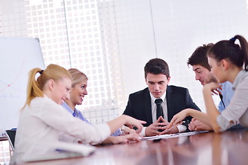 Image showing business people in a meeting at office