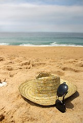 Image showing Seacoast and straw hat 