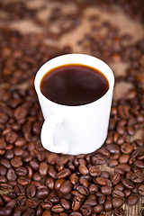 Image showing cup of coffee and beans 