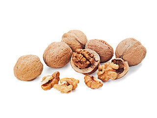 Image showing walnuts and a cracked walnut isolated on the white background 