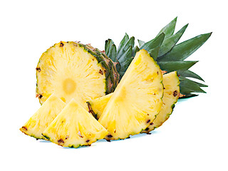 Image showing ripe pineapple with slices  isolated on white background