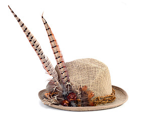 Image showing a hunting hat with pheasant feathers isolated on white backgroun