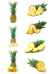 Image showing set fresh pineapple fruits with cut isolated on white