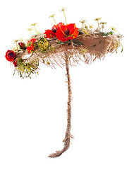 Image showing decorative umbrella of burlap, mats and artificial flowers poppy