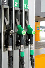 Image showing Fuel Pump Nozzles at Filling Station 