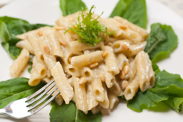 Image showing Italian pasta penne gorgonzola and pine nuts