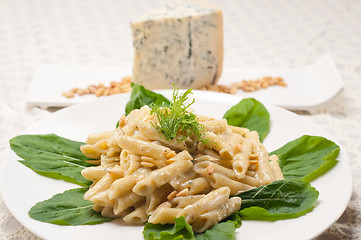 Image showing Italian pasta penne gorgonzola and pine nuts