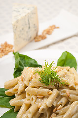 Image showing Italian pasta penne gorgonzola and pine nuts