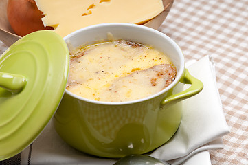 Image showing oinion soup with melted cheese and bread on top