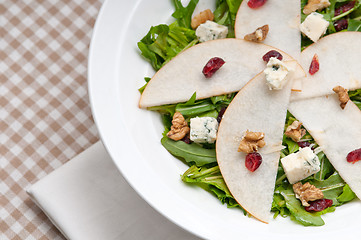 Image showing Fresh pears arugula gorgonzola cheese salad