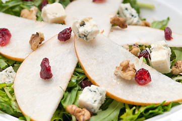 Image showing Fresh pears arugula gorgonzola cheese salad