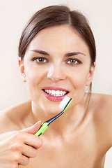 Image showing beautiful woman with tooth-brush l