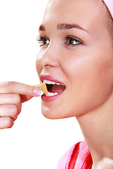 Image showing girl eats sweets