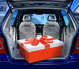 Image showing red present in a car