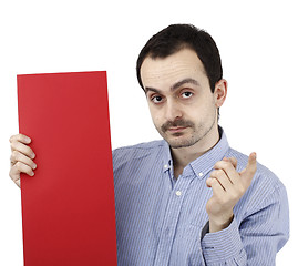 Image showing Man holding a paper