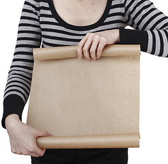 Image showing Woman holding a paper