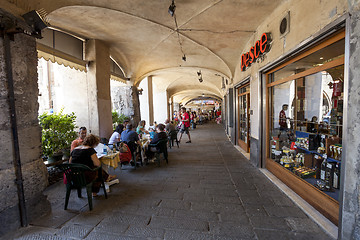 Image showing Tourists in sidewalk cafes in Genoa, Italy