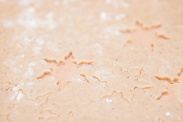 Image showing Gingerbread dough with star shapes