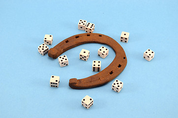 Image showing retro horseshoe gamble dice concept blue 
