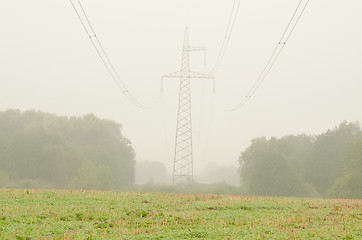 Image showing agriculture field high voltage electricity pole wire fog 