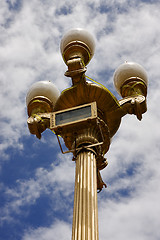 Image showing gold street lamp  and a cloudy sky  in buenos aires 