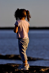 Image showing little girl  near the  beach rio de la plata 