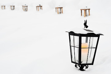 Image showing vintage Christmas lantern with in the cemetery