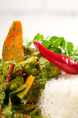 Image showing chicken with green curry vegetables and rice