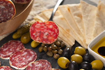 Image showing cold cut platter with pita bread and pickles